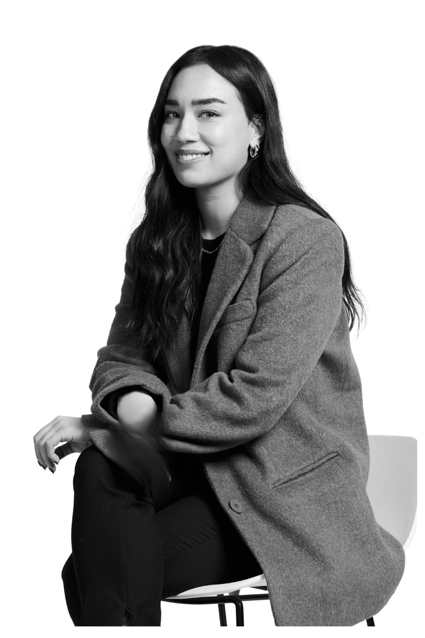 Christina Lawson sitting on a chair, smiling